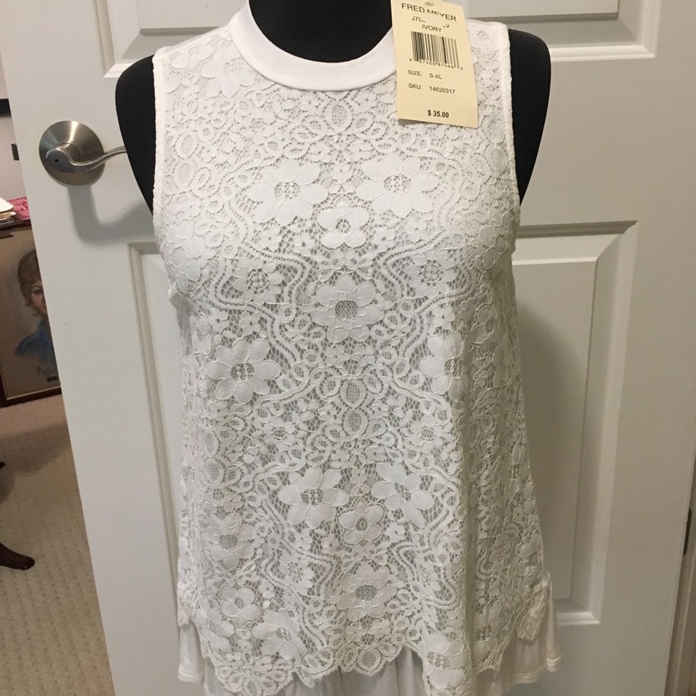 Lacey sleeveless peplum tunic